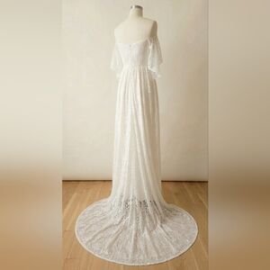 Elegant Off-Shoulder White Lace Wedding Dress with Train